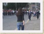 11September05 - Belfast with Caz 112 * Caz taking the piss out of the marchers * 640 x 480 * (137KB)